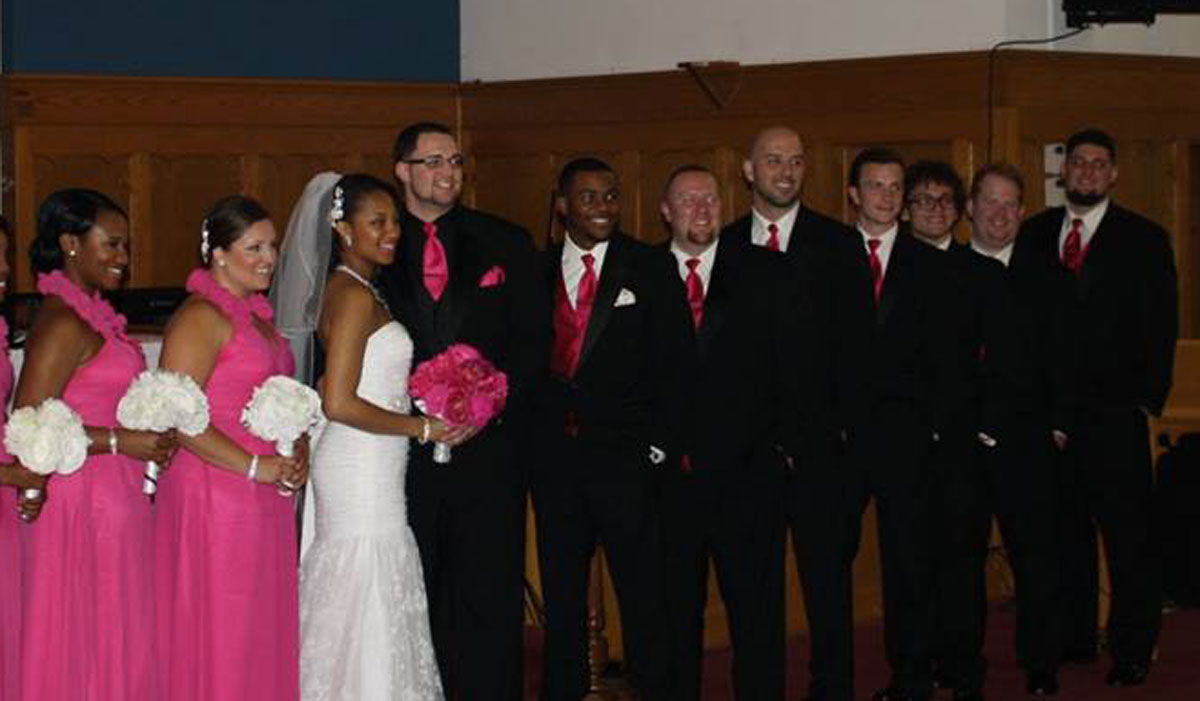 He's the super muscular man getting married here. Zack is so strong he can literally dead-lift a brown bear.